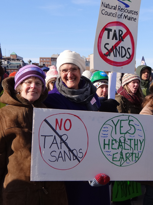 Cathy Johnson, NRCM's North Woods Project Director, and I at the Maine State Pier, listening to Portland Mayor Michael Brennan and others speak out against tar sands oil coming to Maine.