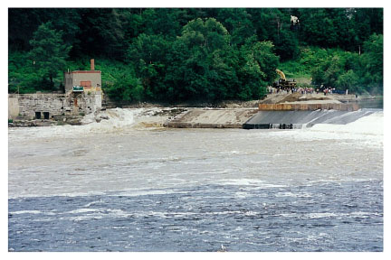 First water flows through breached Edwards Dam on July 1, 1999