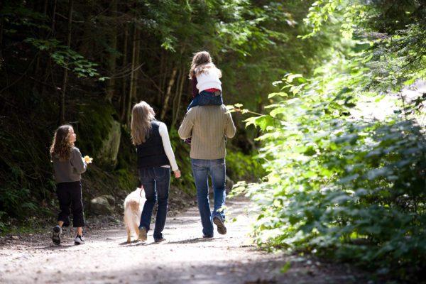 family walking in Maine environment