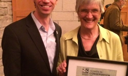 NRCM CEO Lisa Pohlmann is congratulated by Collin O'Mara, President and CEO of the National Wildlife Federation, on her 2015 Women in Conservation Award.