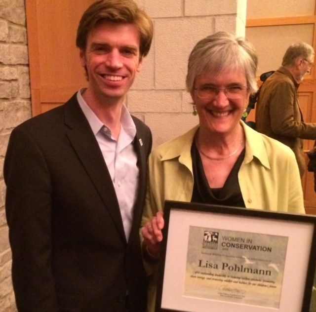 NRCM Executive Director Lisa Pohlmann is congratulated by Collin O'Mara, President and CEO of the National Wildlife Federation, on her 2015 Women in Conservation Award.