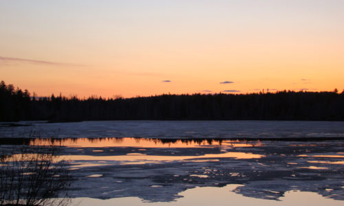 Sunset over Spectacle Pond off Rt. 15 between Monson and Greenville.