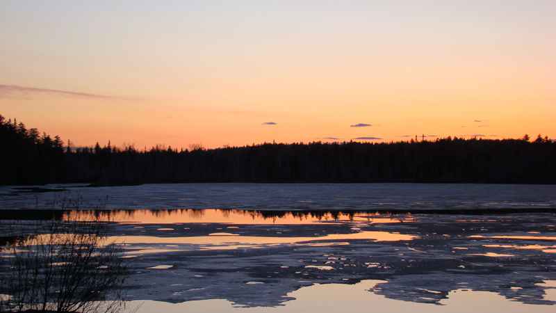 Sunset over Spectacle Pond off Rt. 15 between Monson and Greenville.