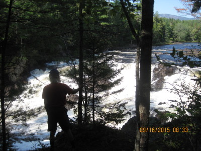 Hartley viewing some rapids on the East Branch