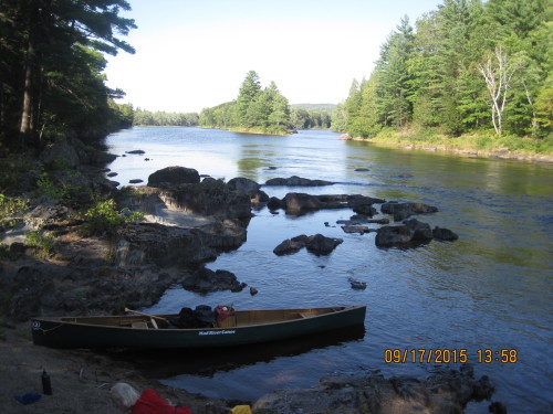 River view of East Branch with canoe