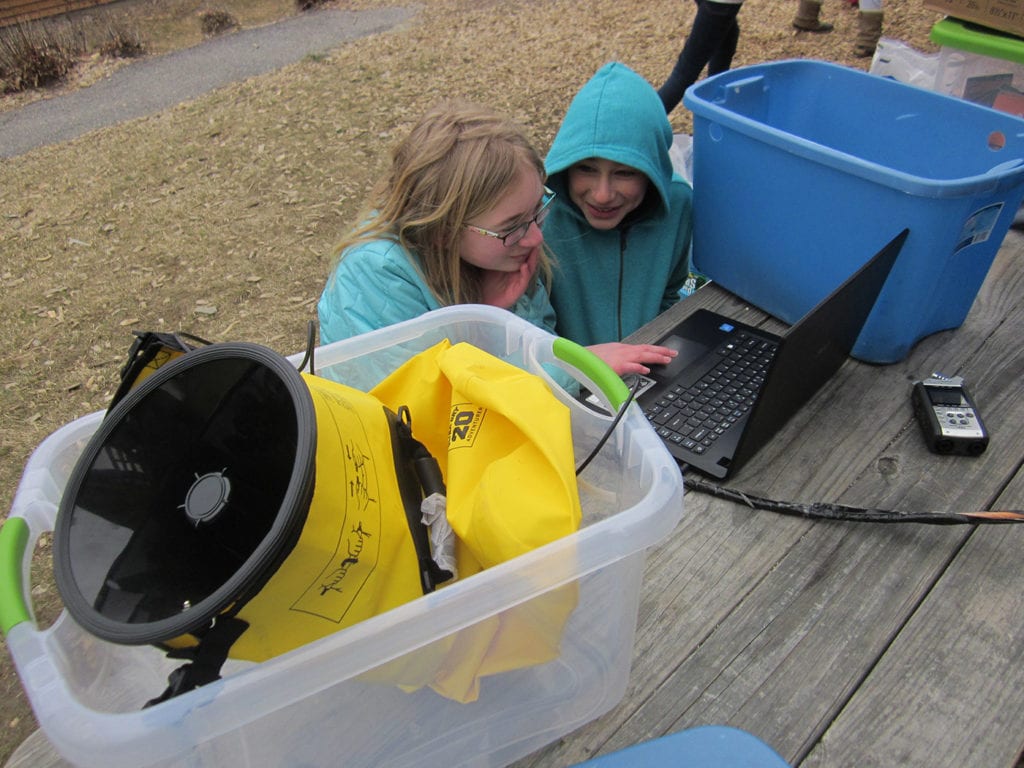 Students setting up the hooting/howling station