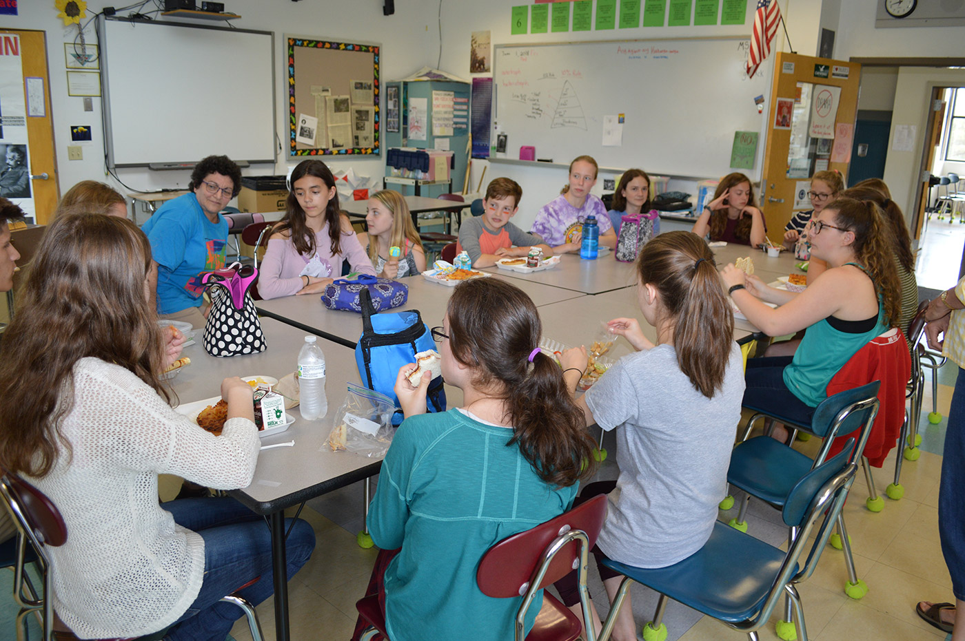 Environmental Club students at Hall-Dale Middle School discuss how their composting program is going. 