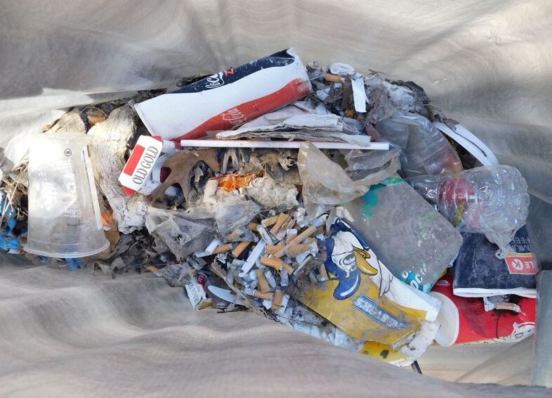 trash at Augusta Trash bag contents from pickup at Mill Park, Augusta.