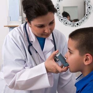 boy with asthma at doctor's office