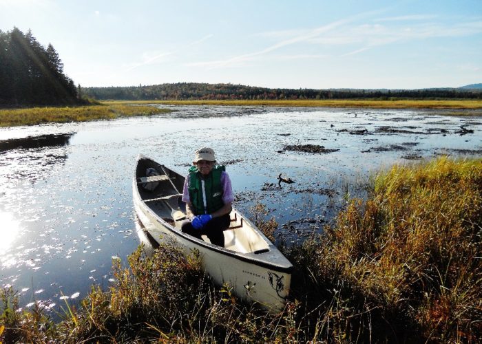 sitting in the bow of our canoe