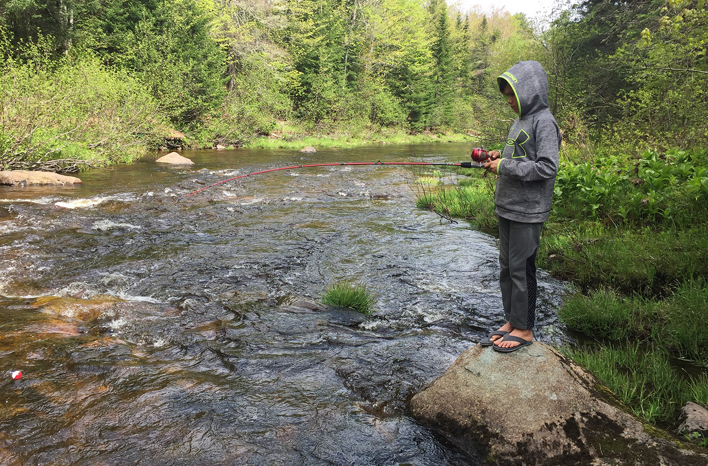 fishing in a Maine river