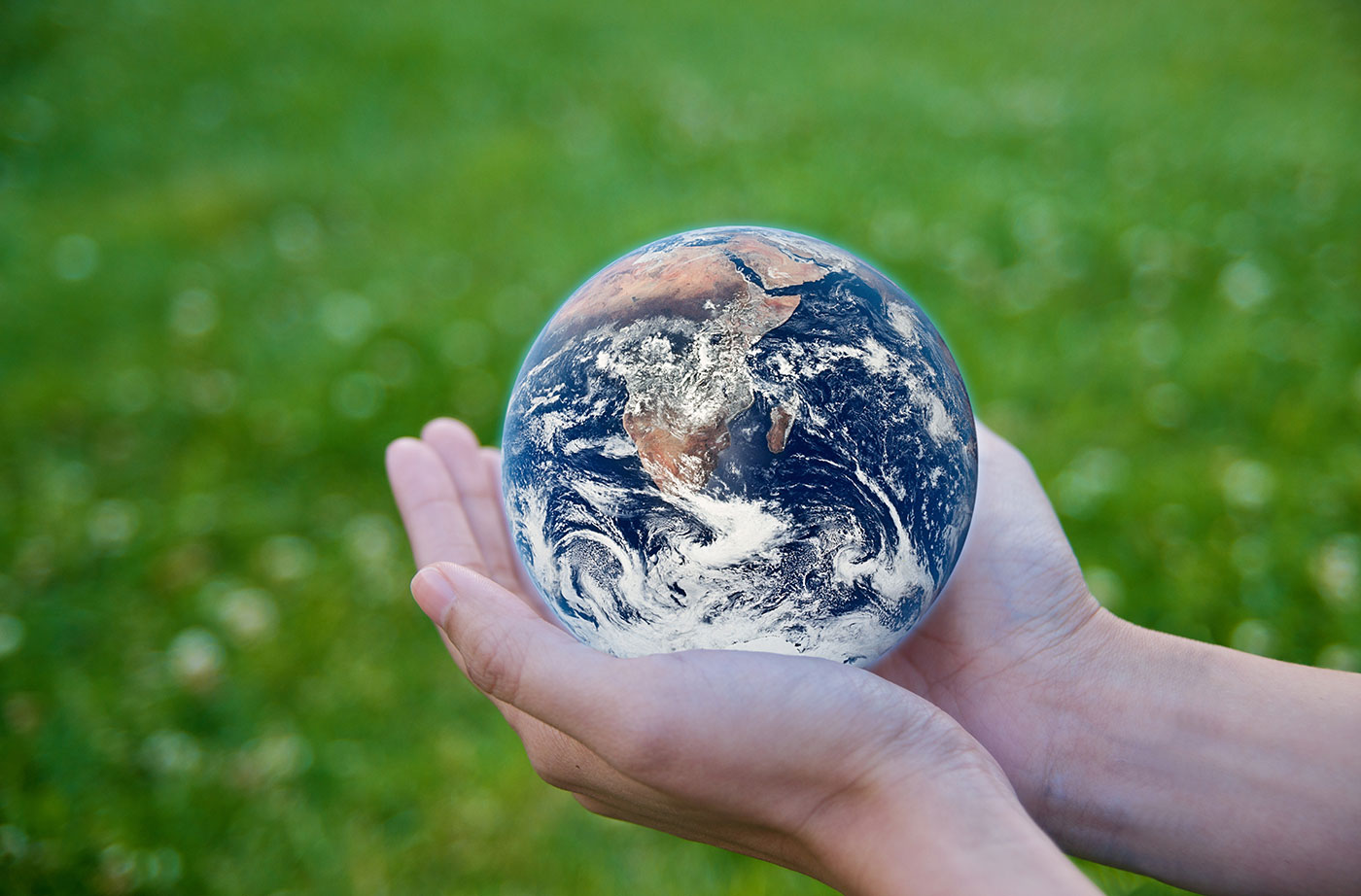 Earth globe in hands