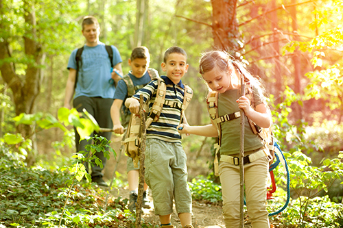 kids hiking in woods