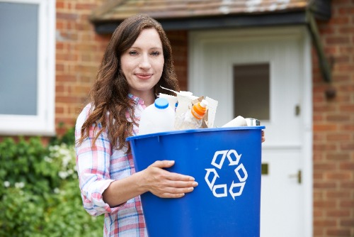 woman with recycle bin