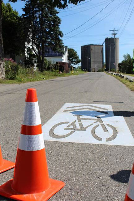 painting bike route on pavement