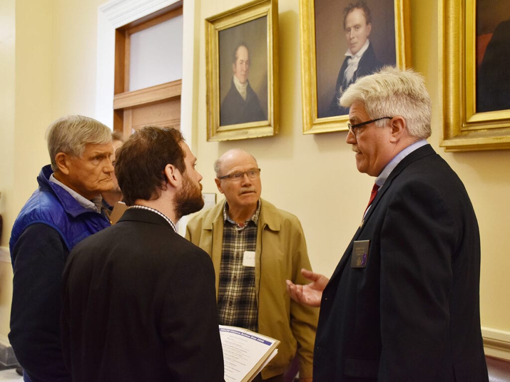 NRCM members speak with Sen. Bob Foley at Maine State House