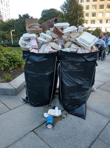 trash bags of trash and recyclables