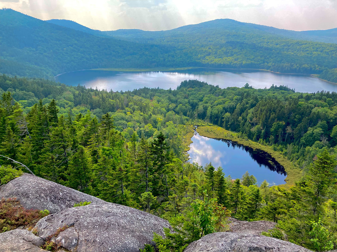 view of pond from mountaintop