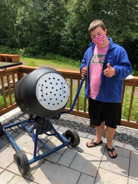 student with new composter