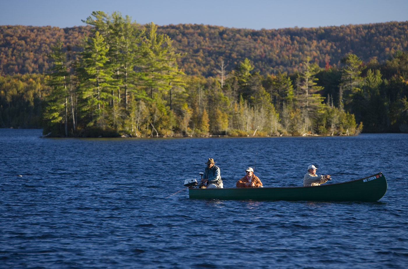 Monkman-Moosehead-fishing2 men in boat fishing on Moosehead Lake