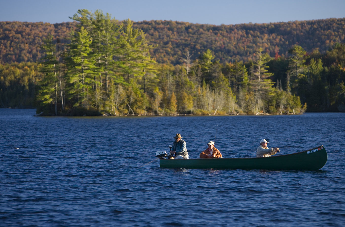 men in boat fishing on Moosehead Lake