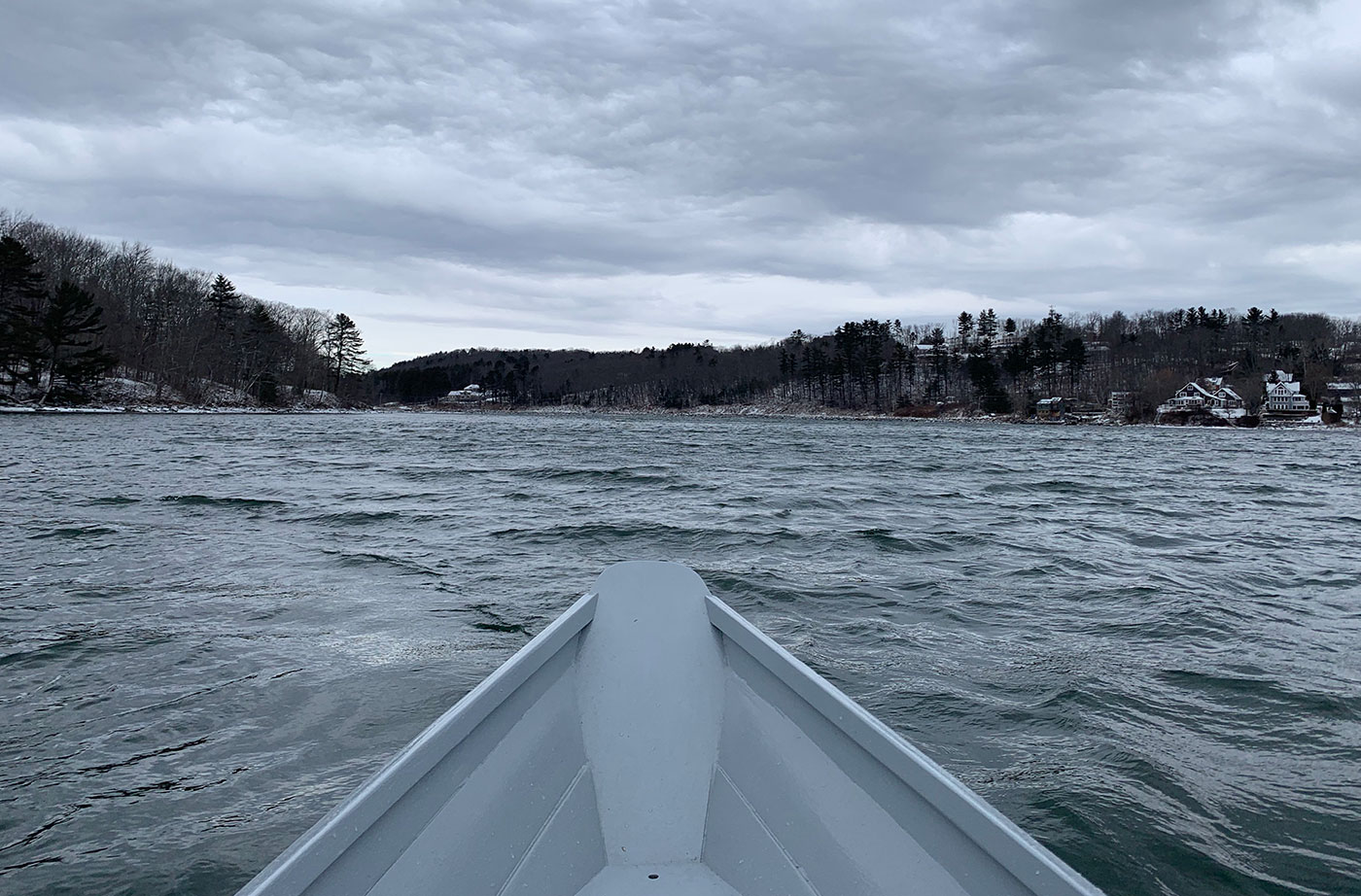 wind and waves and front of rowboat