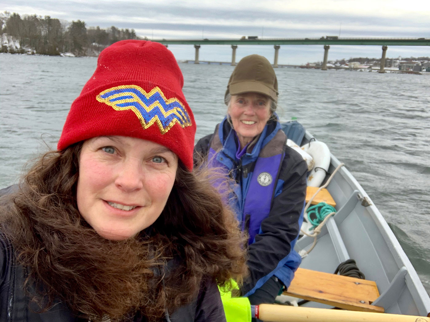 two people rowing in Belfast Bay