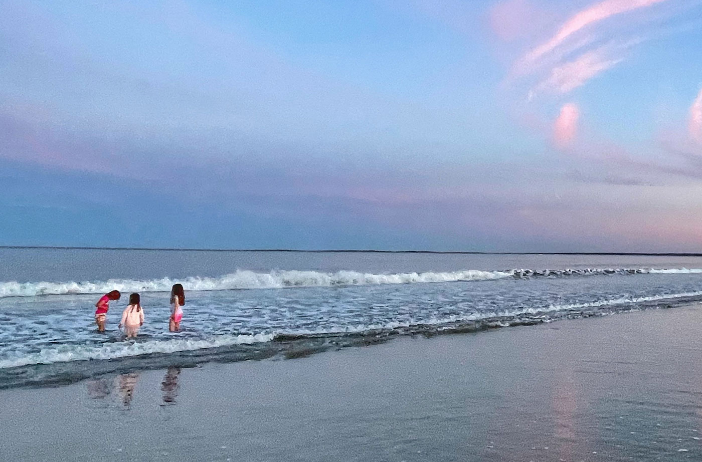 children playing in ocean