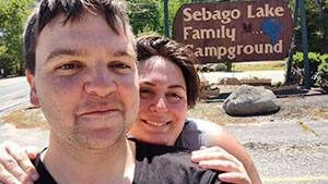 Abben and Julia in front of Sebago campground sign
