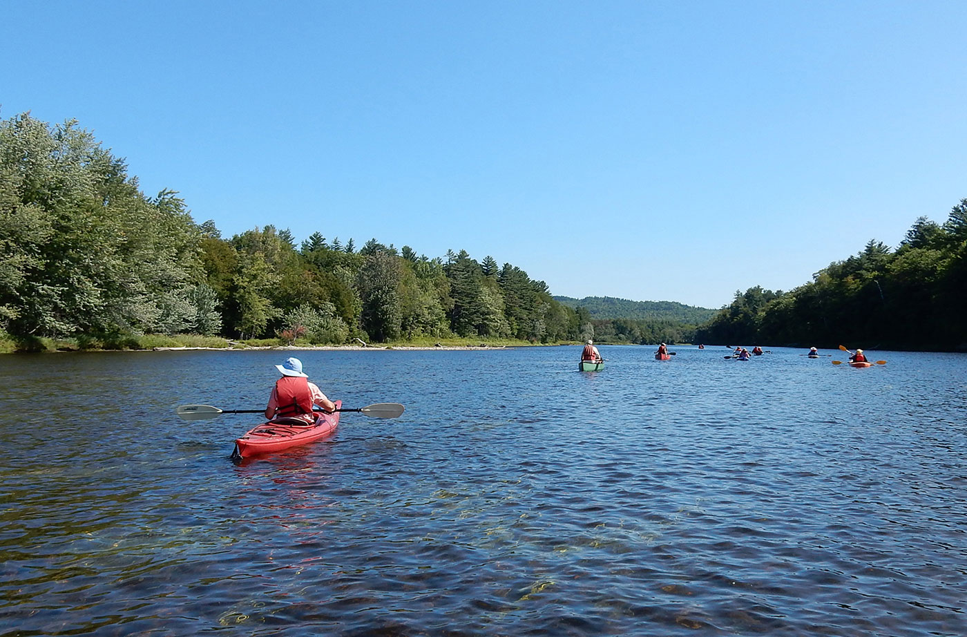 People paddling on Androscoggin River