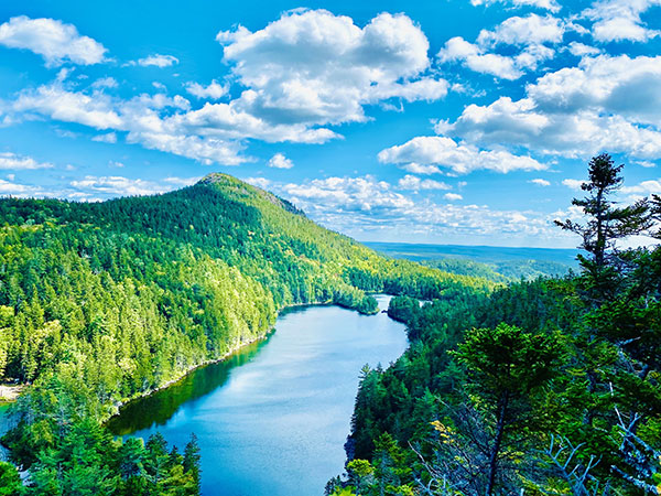 water and mountains with blue sky