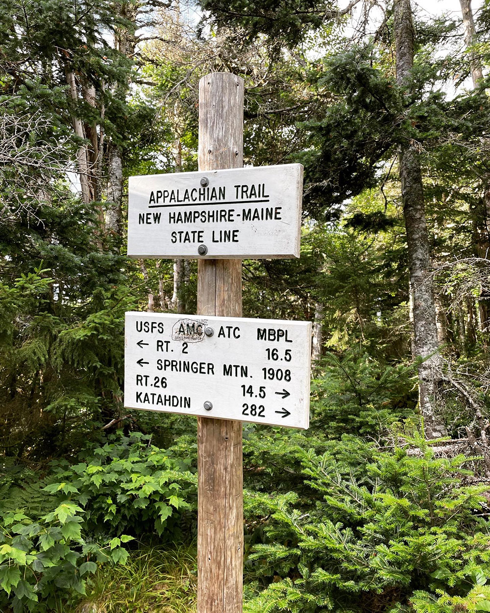 Maine-NH border sign for Appalachian Trail