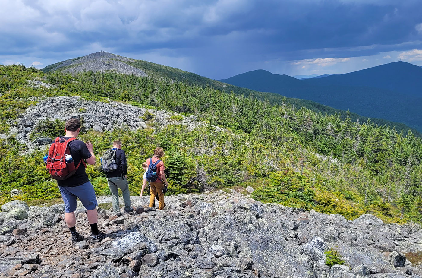 people hiking Mt Abraham