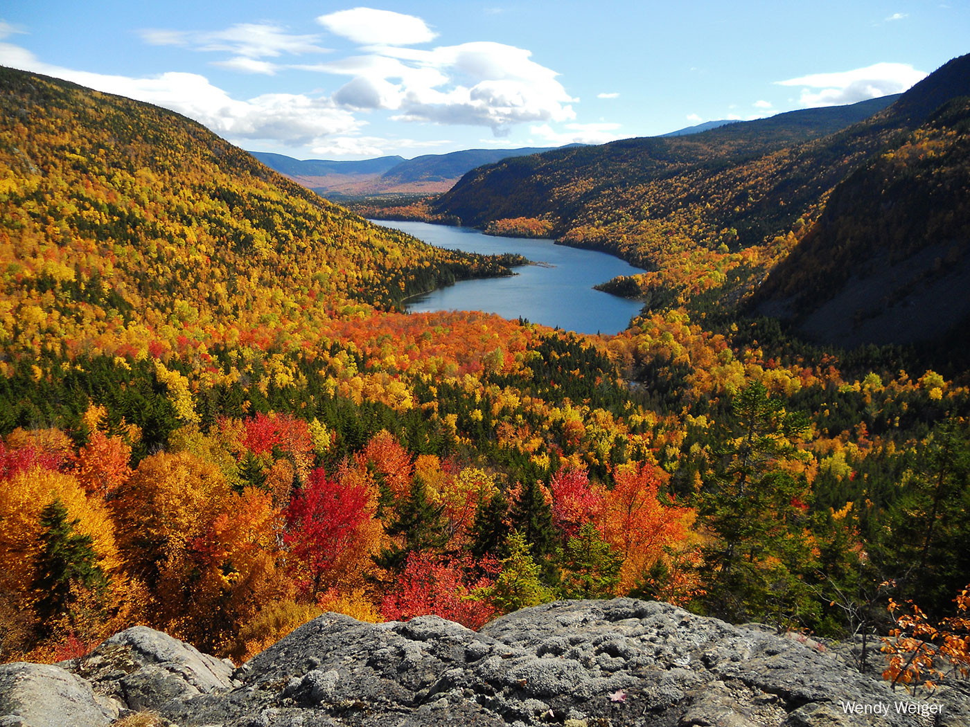 lake and mountains during fall foliage