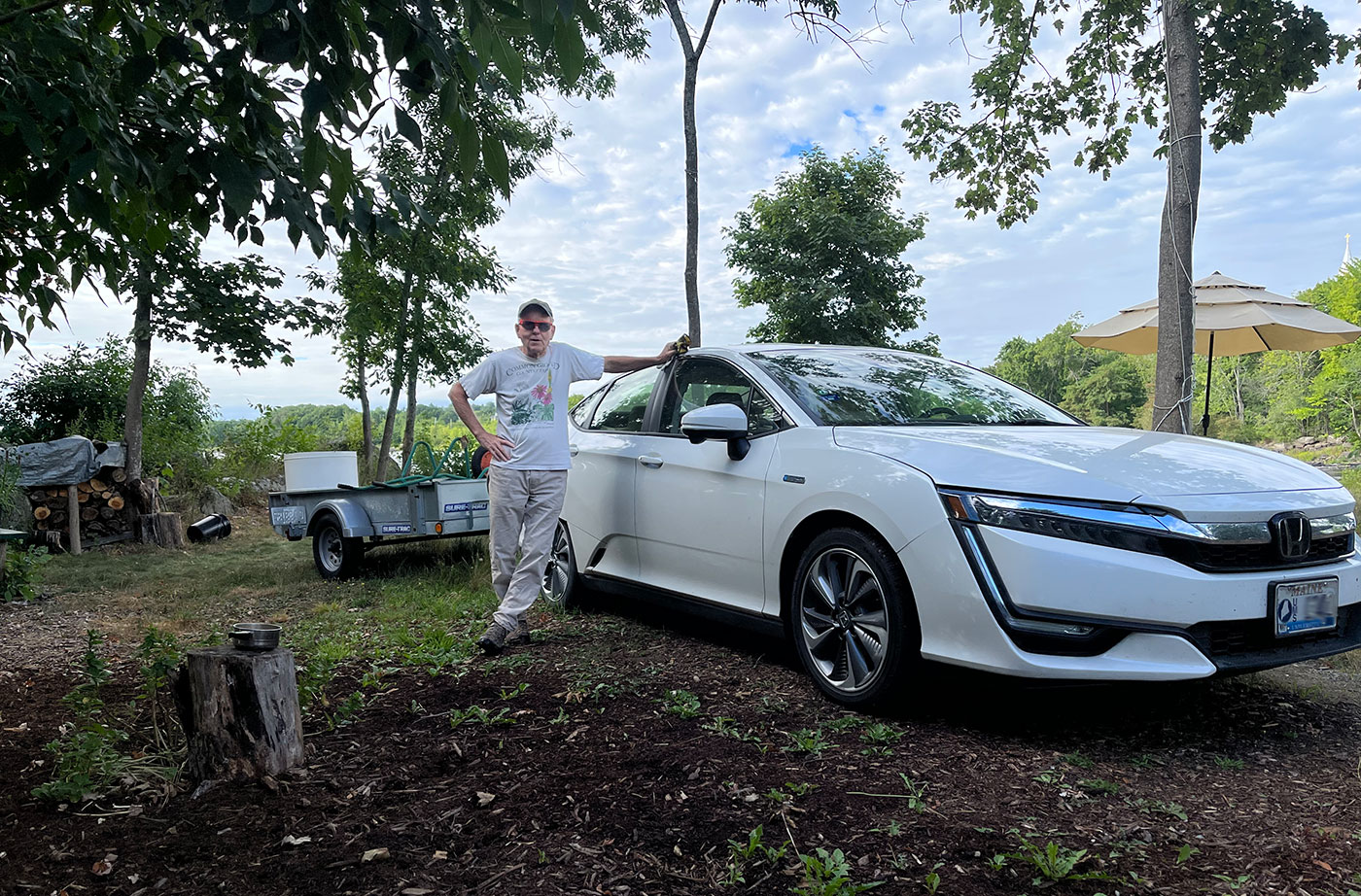 man with electric vehicle outside