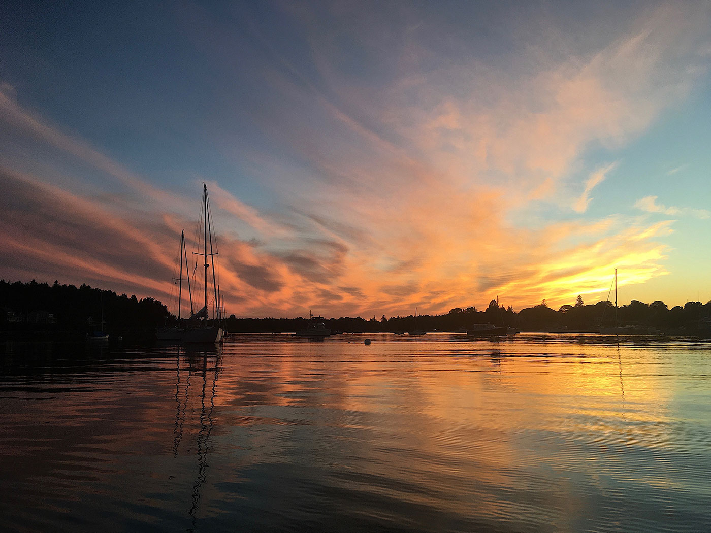 sunset over boats in Tenants Harbor