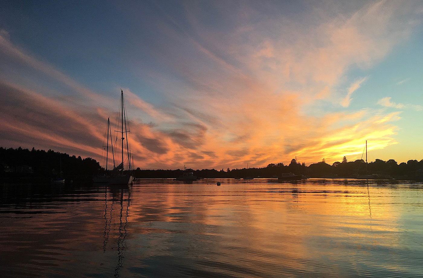 sunset over boats in Tenants Harbor