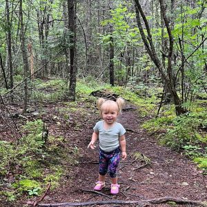 child in woods