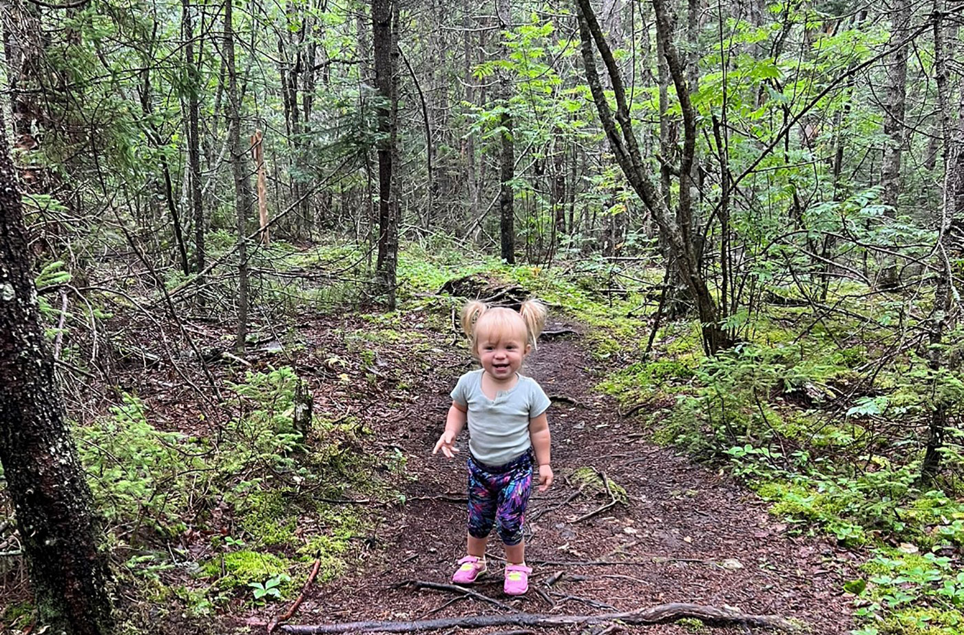 child in woods