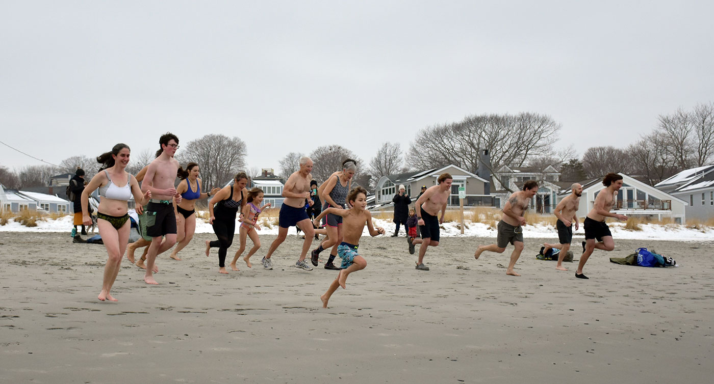 racing into ocean at Willard Beach Dip & Dash