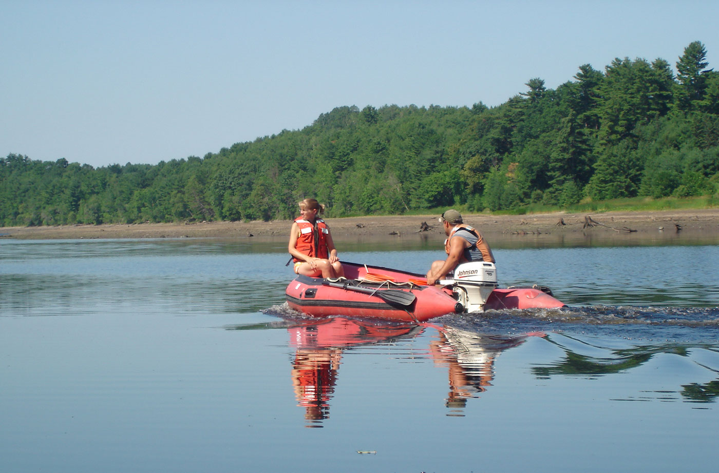 people in boat relocating mussels in Sebasticook River