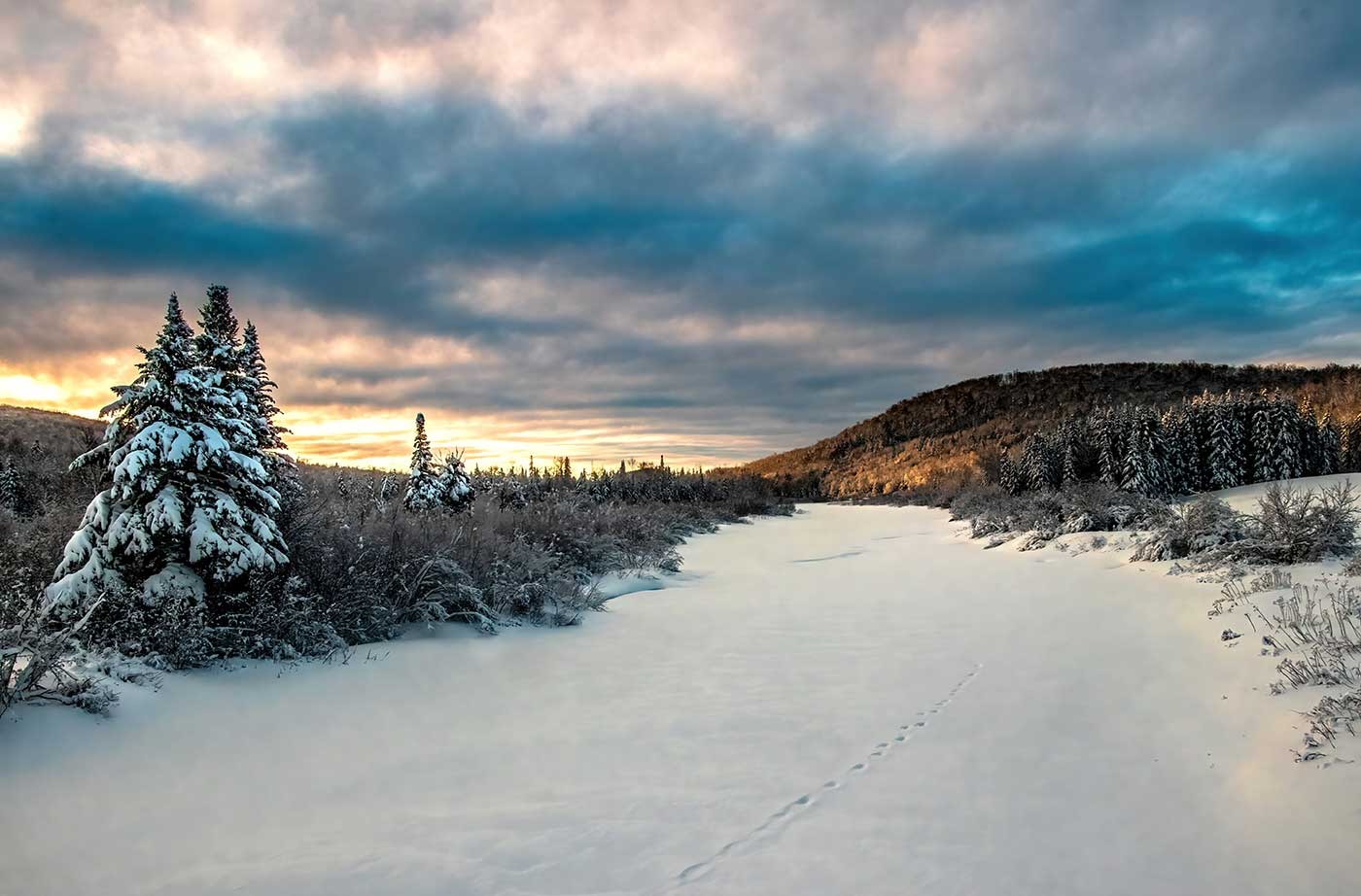 Sunrise over snowy Mattawamkeag River