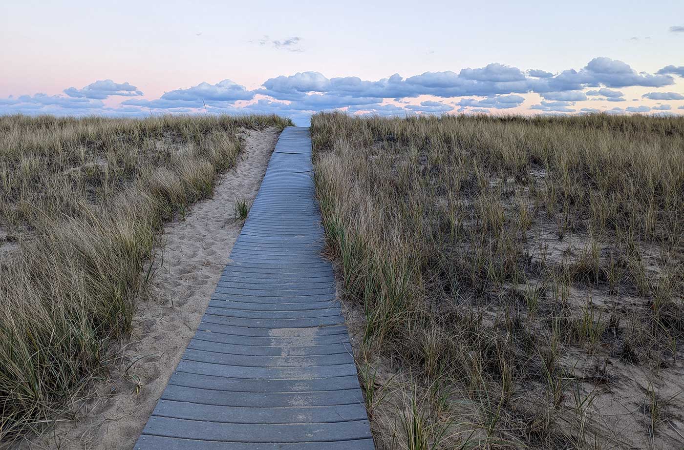 Walkway through dunes to beach