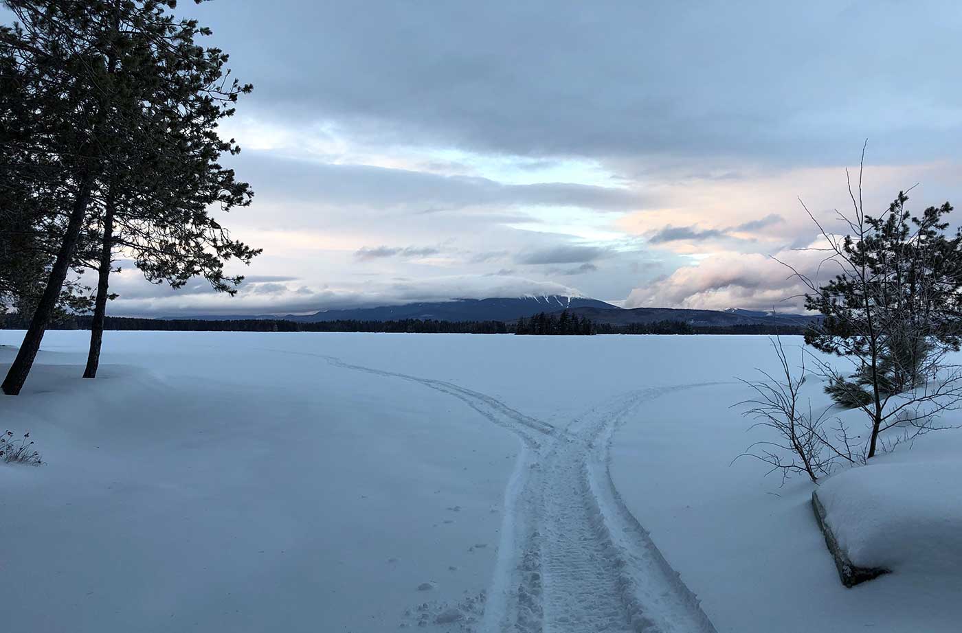 paths through snow with Katahdin in the background