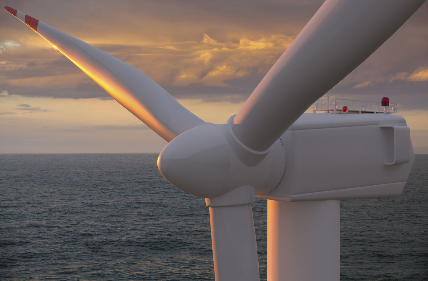 Offshore Wind turbine with ocean sunset in background
