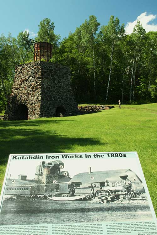 Sign with information about Katahdin Iron Works historic site