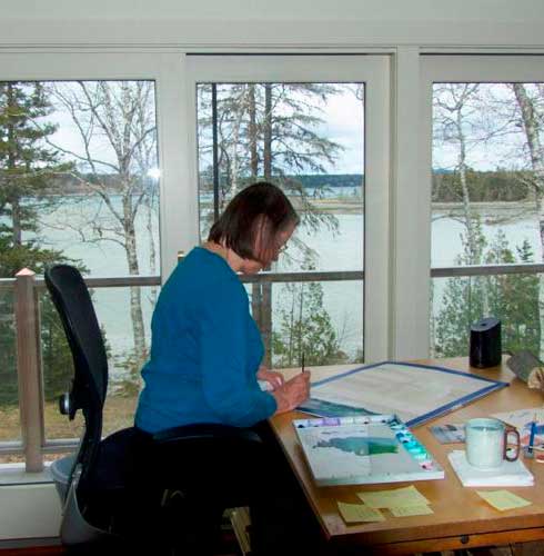 artist working in her studio