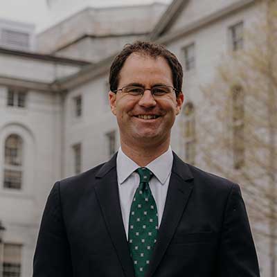 Jack Shapiro smiling in front of State House