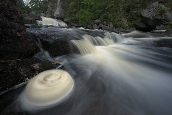 A spinning cake of foam at Lower Falls