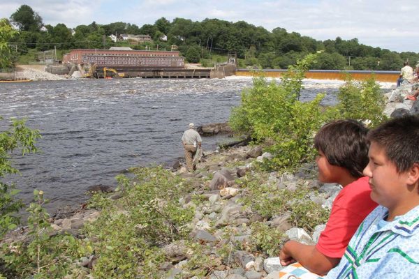 Young boys watching breaching of Veazie Dam on Penobscot River